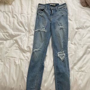Levi’s 721 high rise skinny ripped jeans
